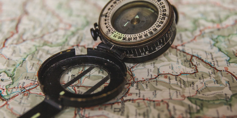 open-compass-on-world-map.jpg